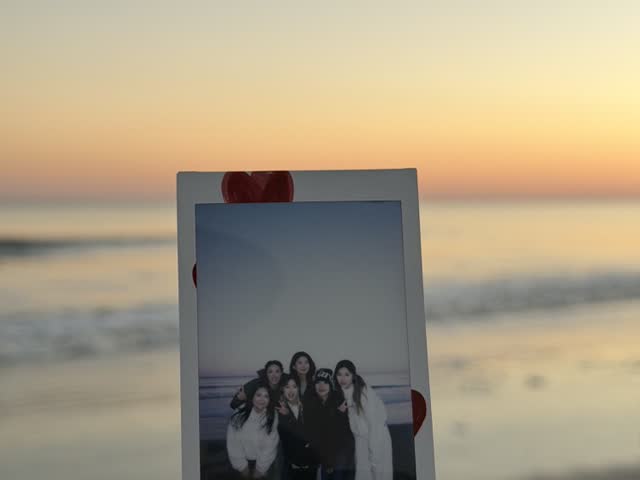 A polaroid at the shore