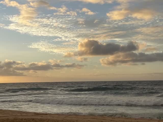 Sunset over the surf